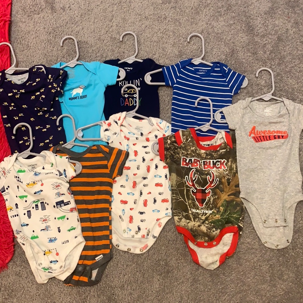 9 onesies. All 0-3, 3 months and one 3-6 months.
